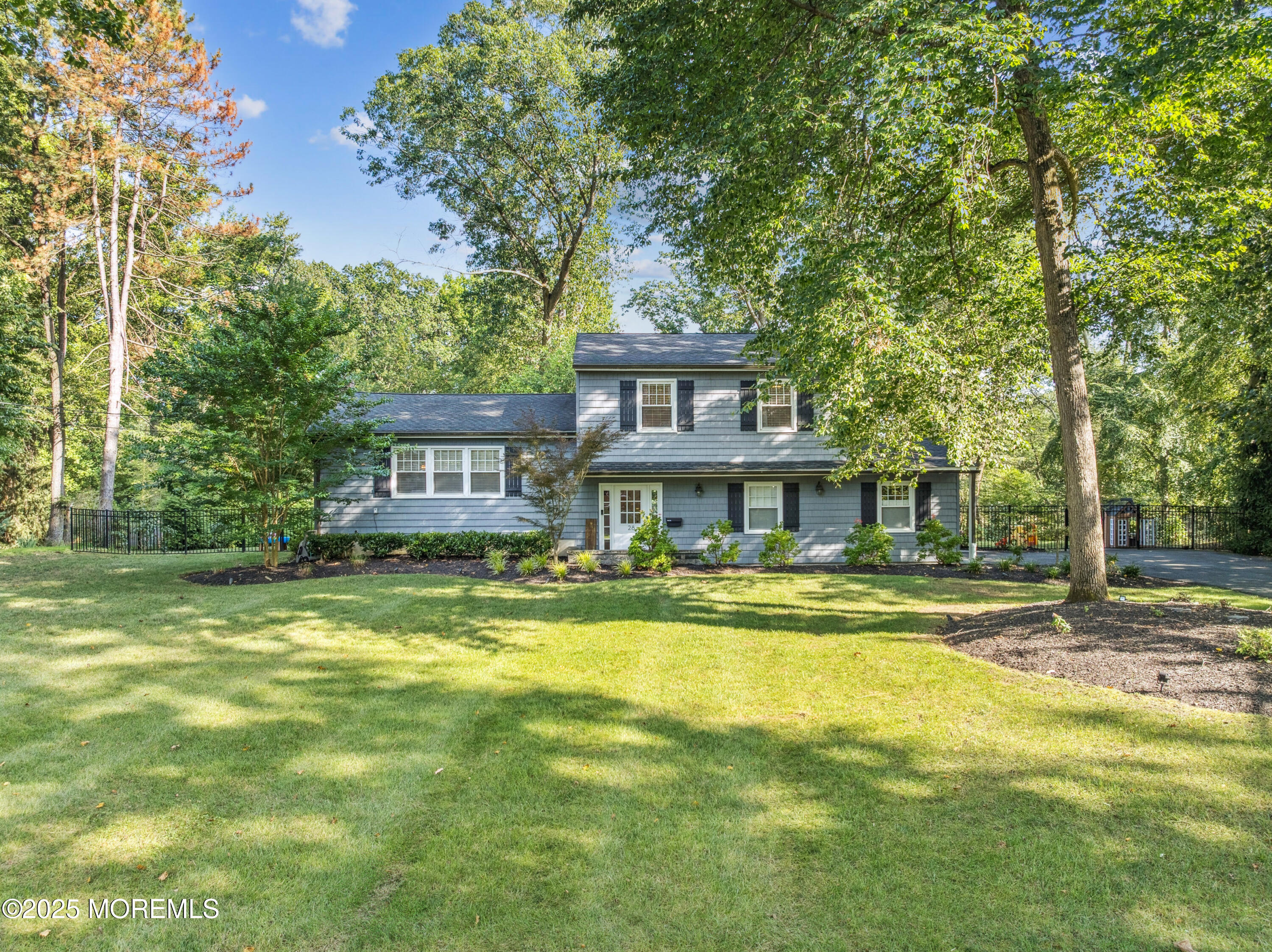 28 High Point Road Lincroft, NJ 07738 - Photo 3 of 42 a view of a large trees in front of a house