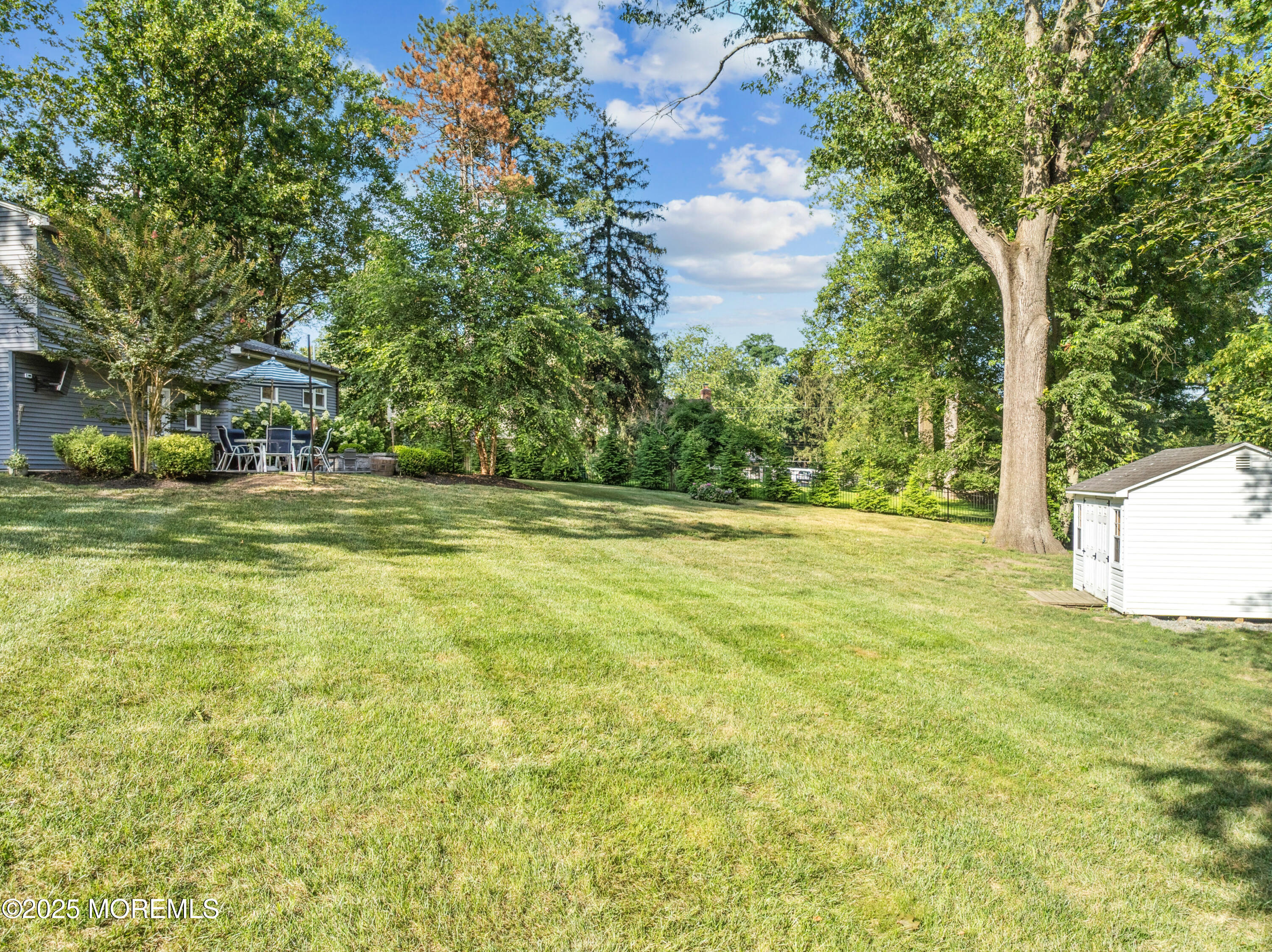 28 High Point Road Lincroft, NJ 07738 - Photo 34 of 42 a view of a field with trees in the background