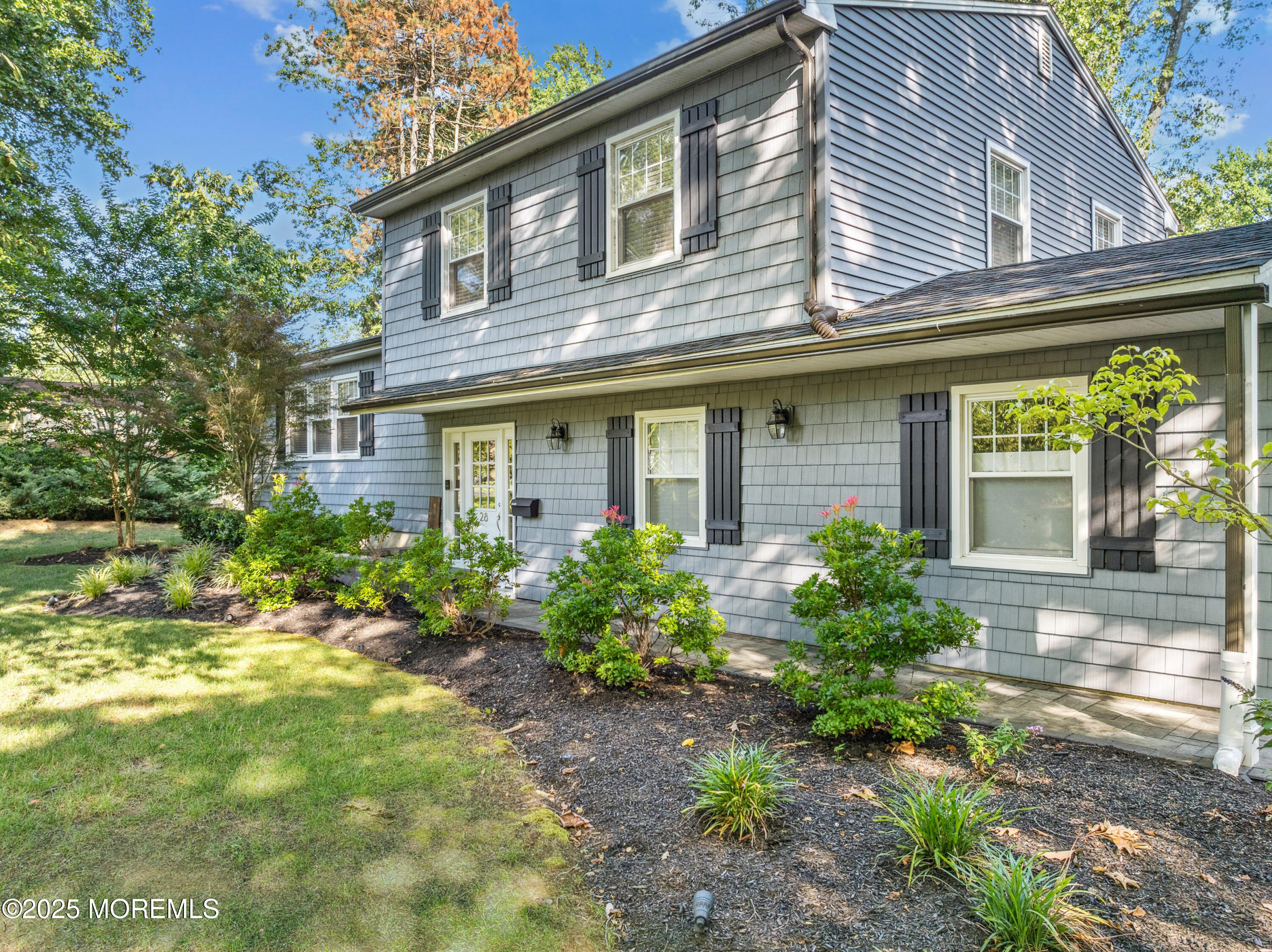 28 High Point Road Lincroft, NJ 07738 - Photo 36 of 42 front view of a house with a yard
