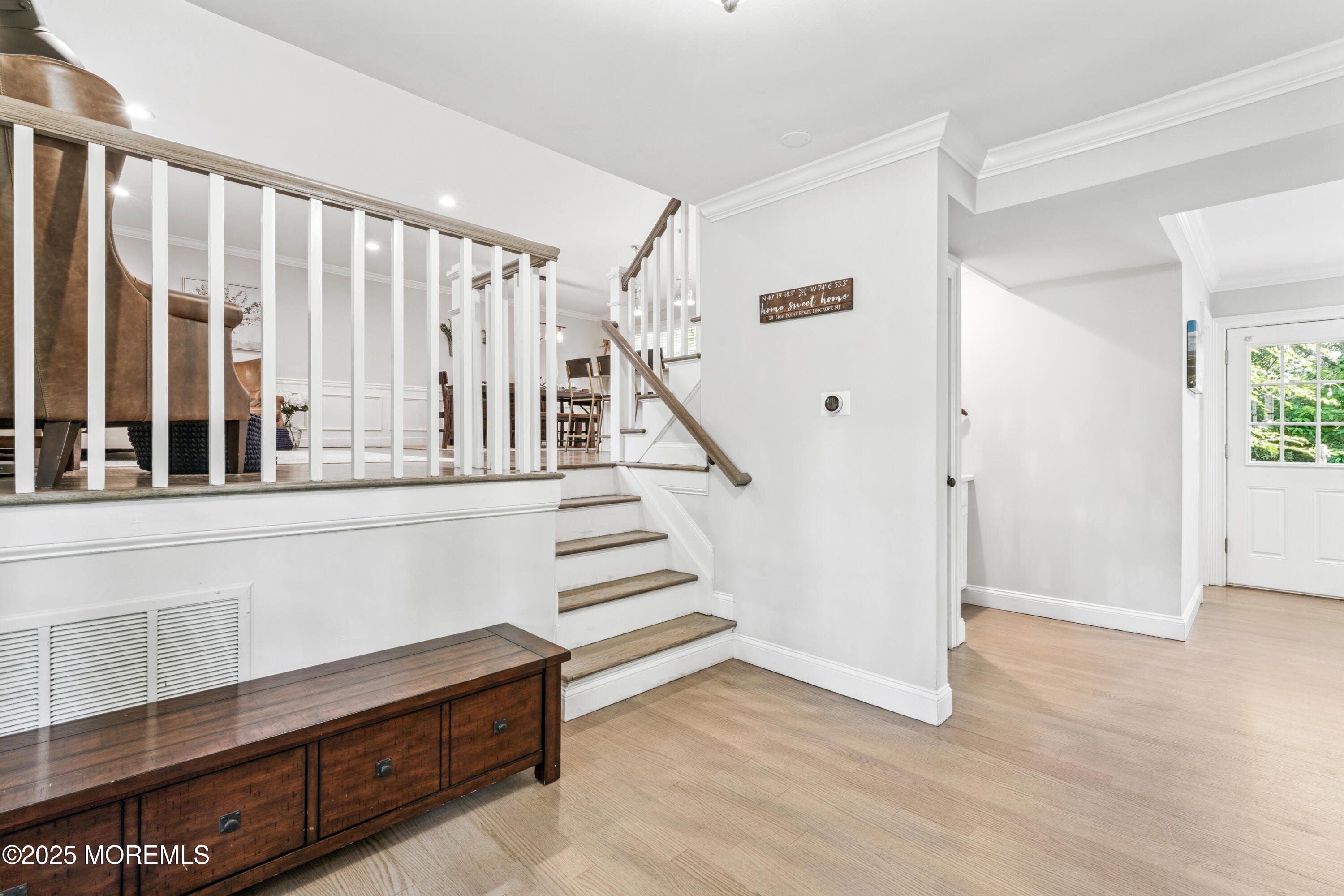 28 High Point Road Lincroft, NJ 07738 - Photo 5 of 42 a view of staircase with white walls and a window