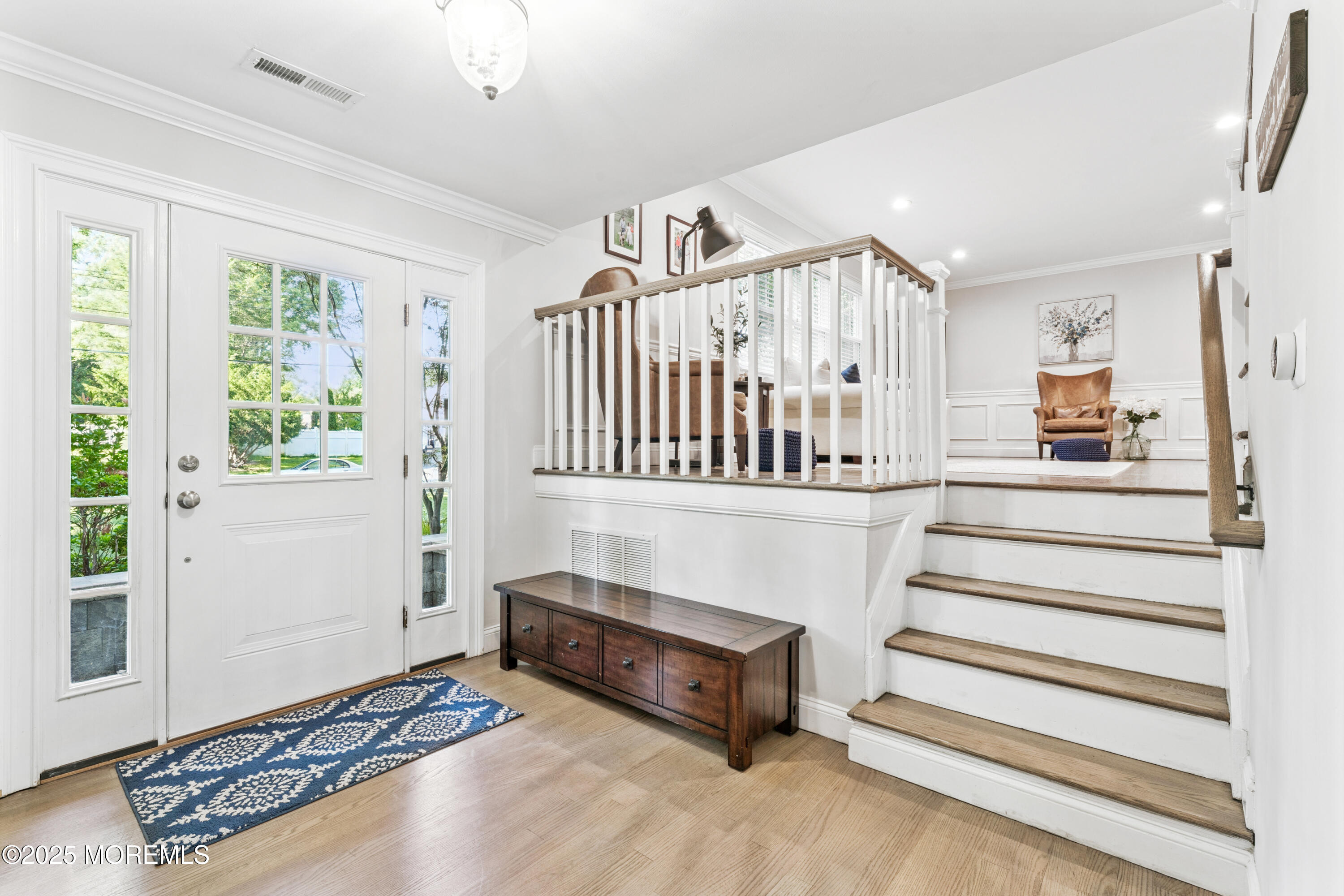 28 High Point Road Lincroft, NJ 07738 - Photo 6 of 42 a view of entryway bedroom and hall with wooden floor
