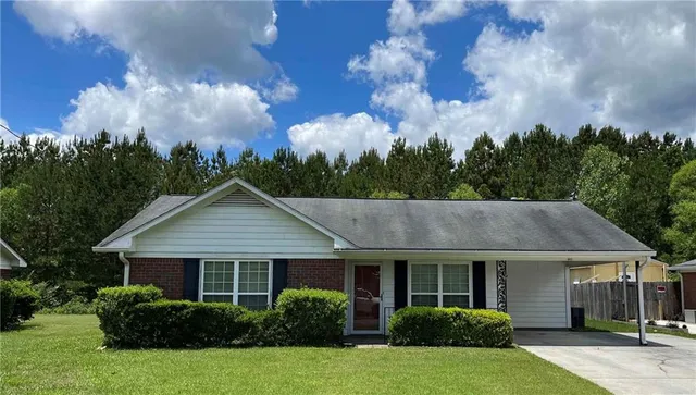a view of empty room with windows