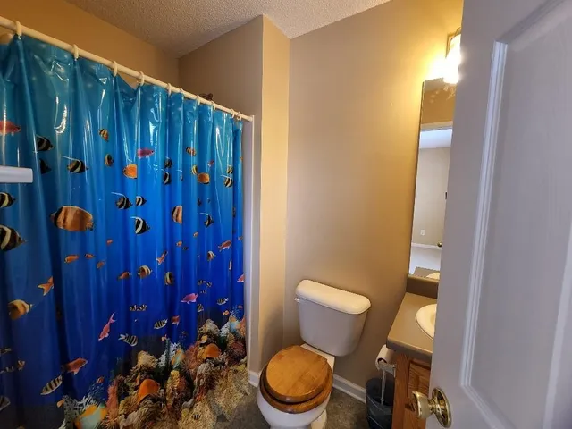 a view of a table and chairs in the garden