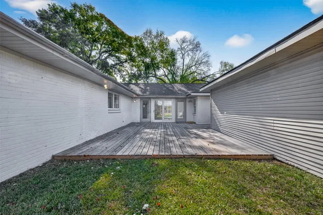 a view of a backyard with a garden