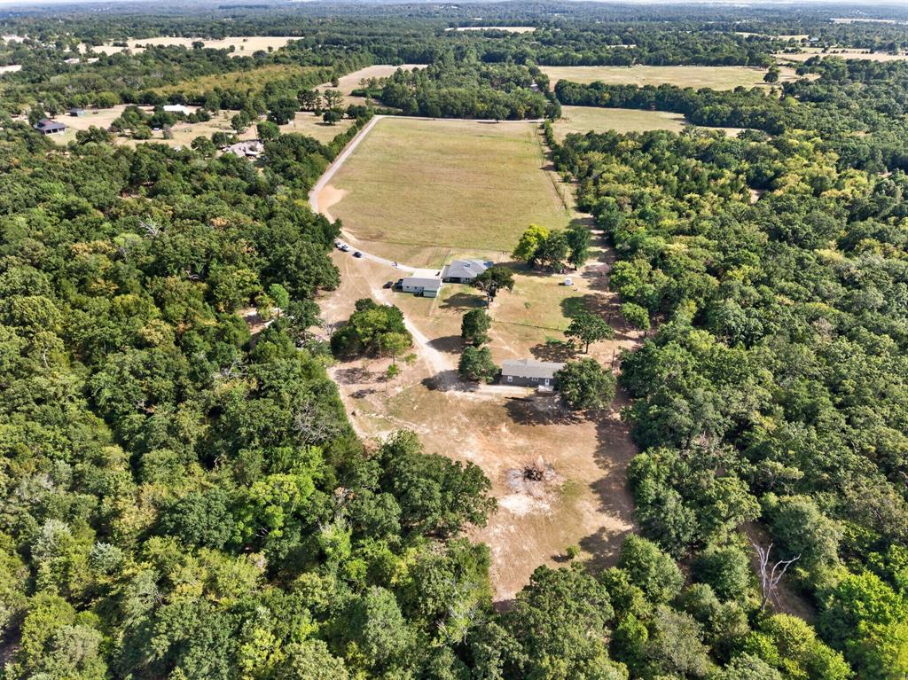 660 VZ County Road Canton, TX 75103 - Photo 37 of 39 Expansive property featuring mature trees, open clearings, and a developed road system
