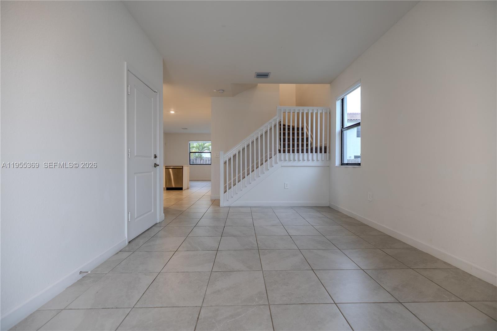24671 Southwest 119th Place Homestead, FL 33032 - Photo 6 of 31 a view of a hallway