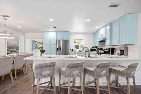 a kitchen with counter space cabinets and appliances