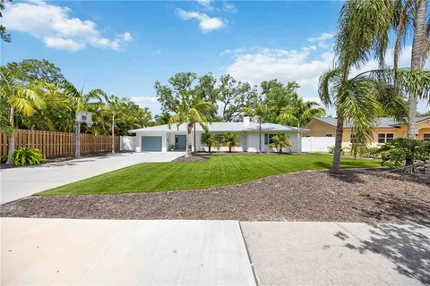 a house with a garden and pathway