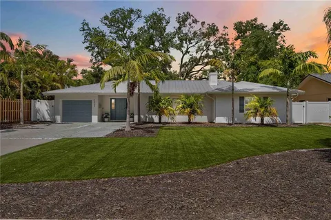 a view of a yard with a house and garden