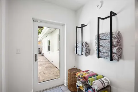 a bedroom with bed and a window