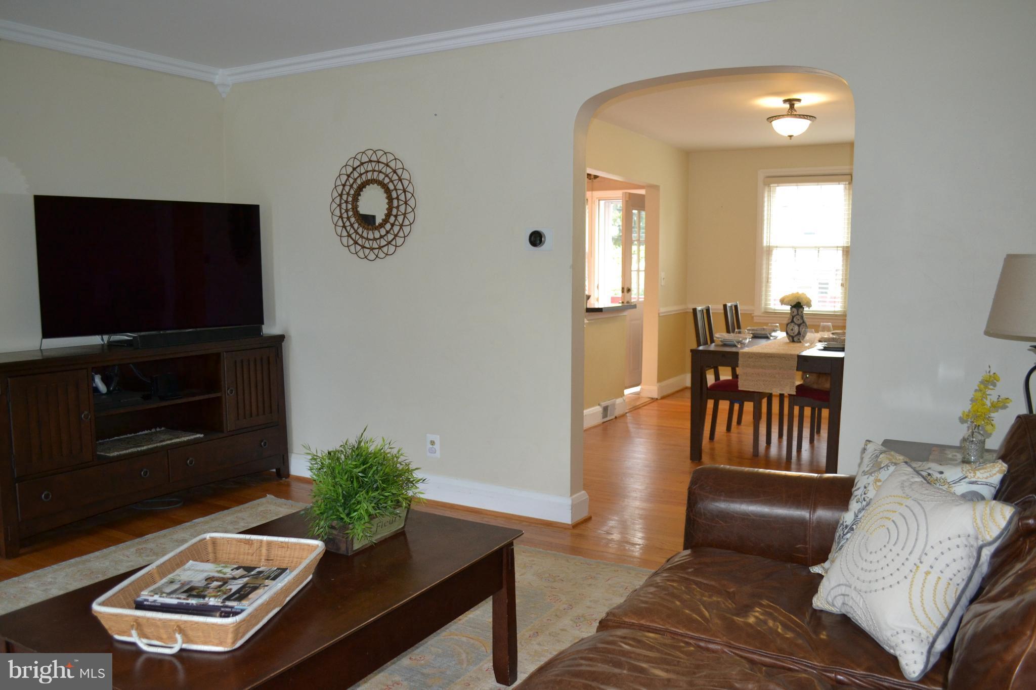 412 Overbrook Road Baltimore, MD 21212 - Photo 8 of 26 a living room with furniture and a flat screen tv