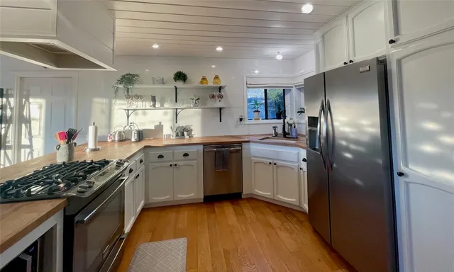 a living room with furniture or couch and a fireplace