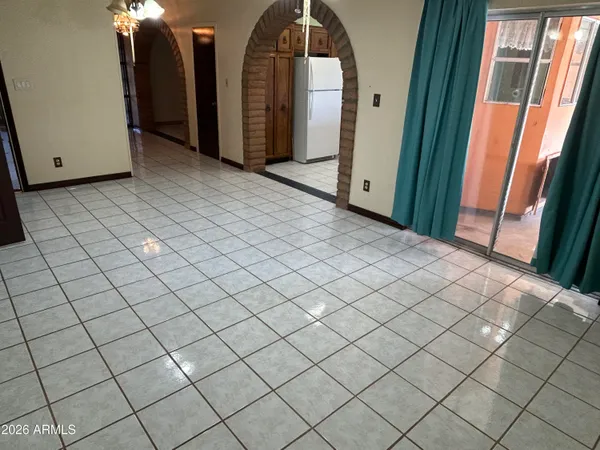 a kitchen with stainless steel appliances a refrigerator and a stove