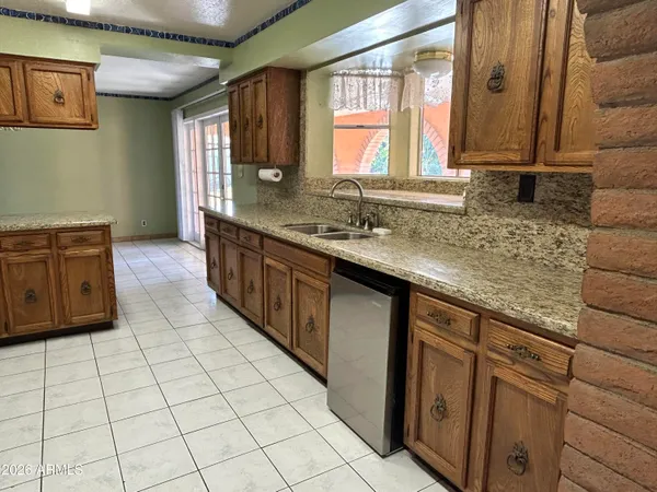 a bathroom with a toilet and shower