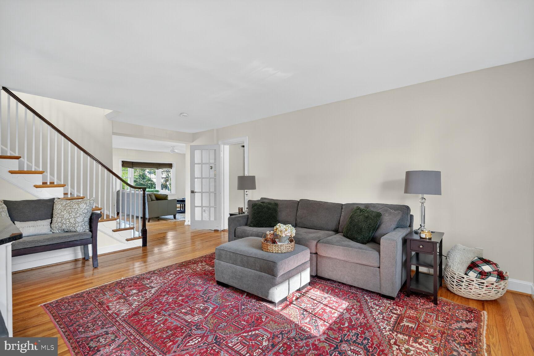 10406 Ewell Avenue Kensington, MD 20895 - Photo 13 of 42 a living room with furniture and a rug