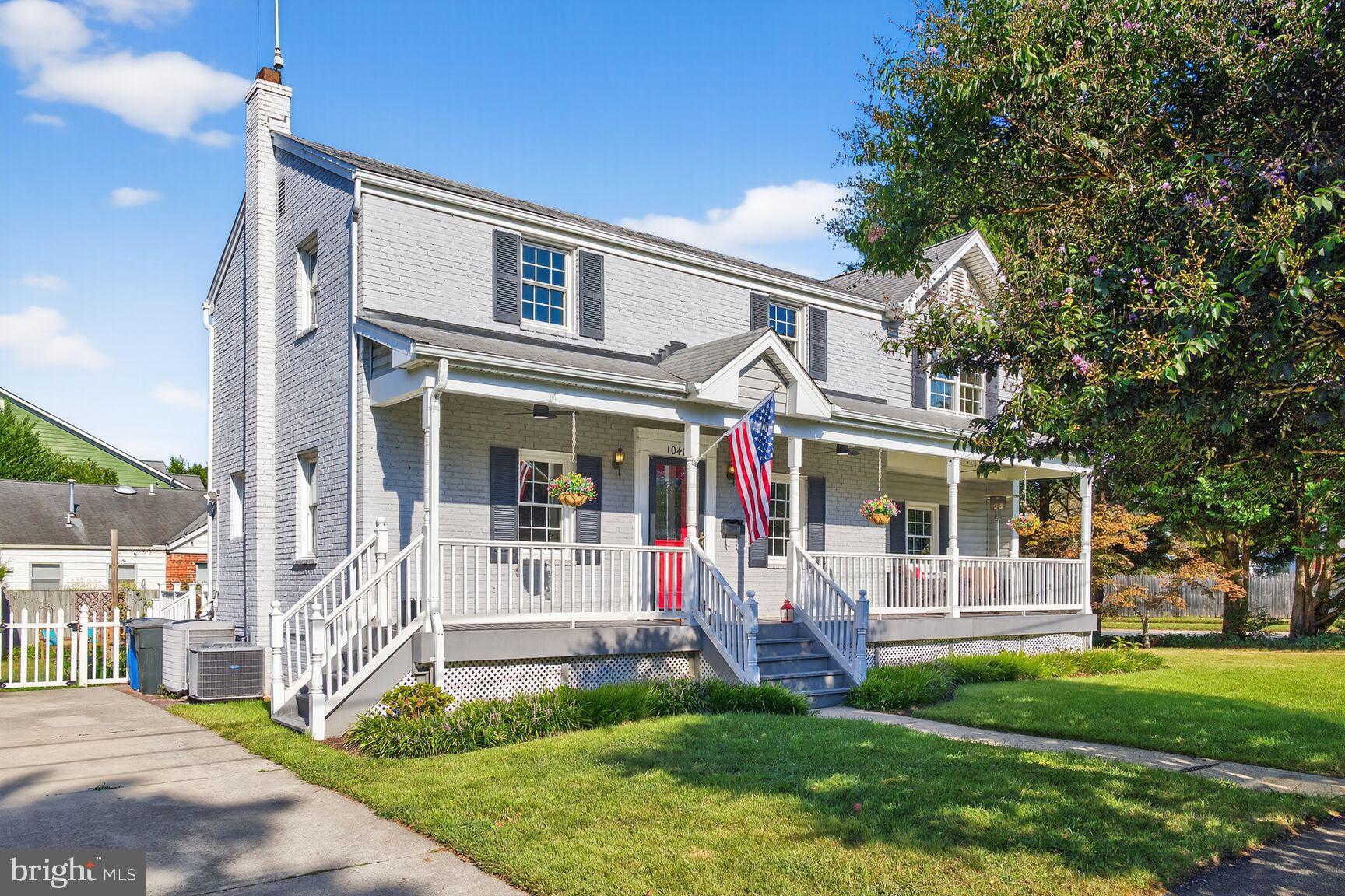 10406 Ewell Avenue Kensington, MD 20895 - Photo 2 of 42 a front view of a house with a yard