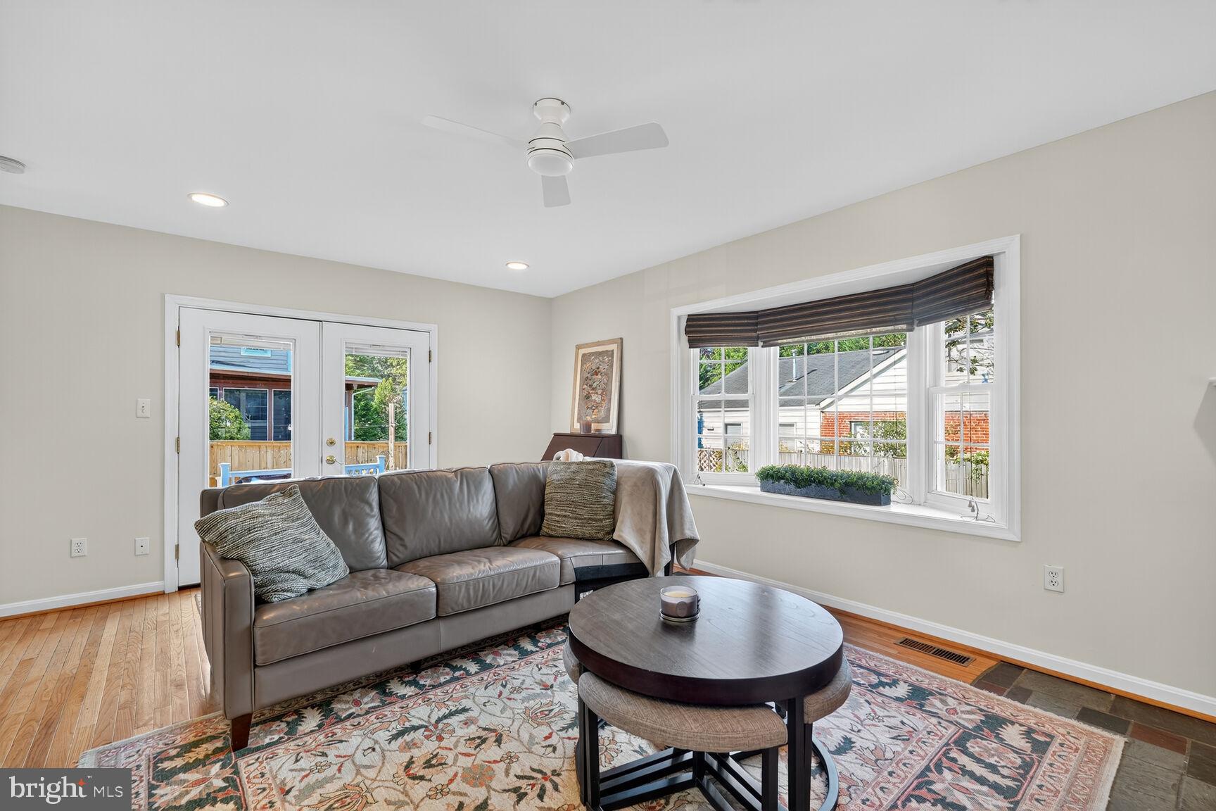 10406 Ewell Avenue Kensington, MD 20895 - Photo 24 of 42 a living room with furniture and a window