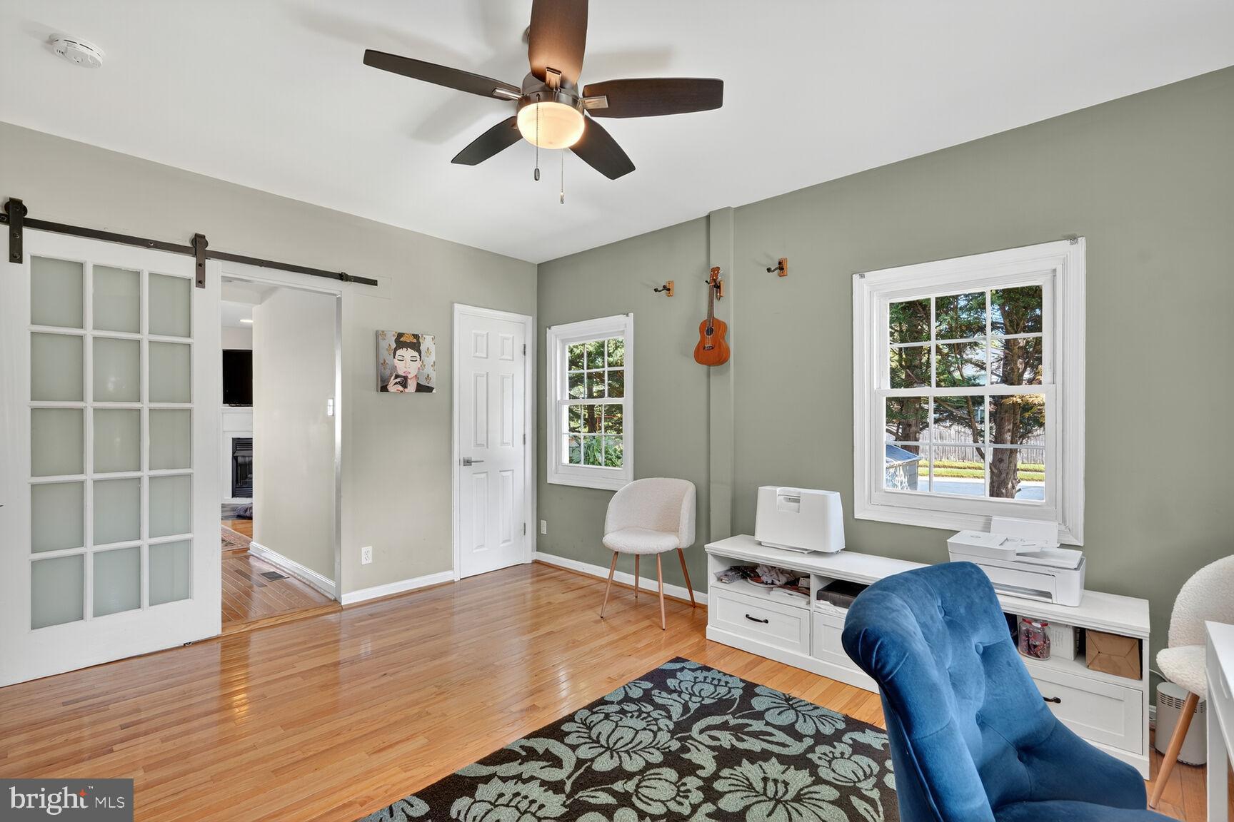 10406 Ewell Avenue Kensington, MD 20895 - Photo 28 of 42 a living room with furniture and a window