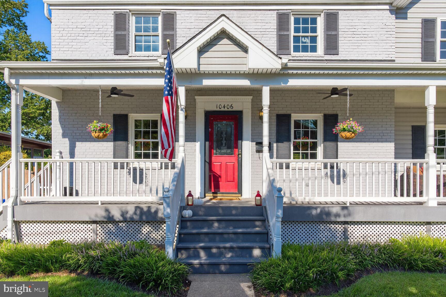 10406 Ewell Avenue Kensington, MD 20895 - Photo 3 of 42 front view of a house with a porch