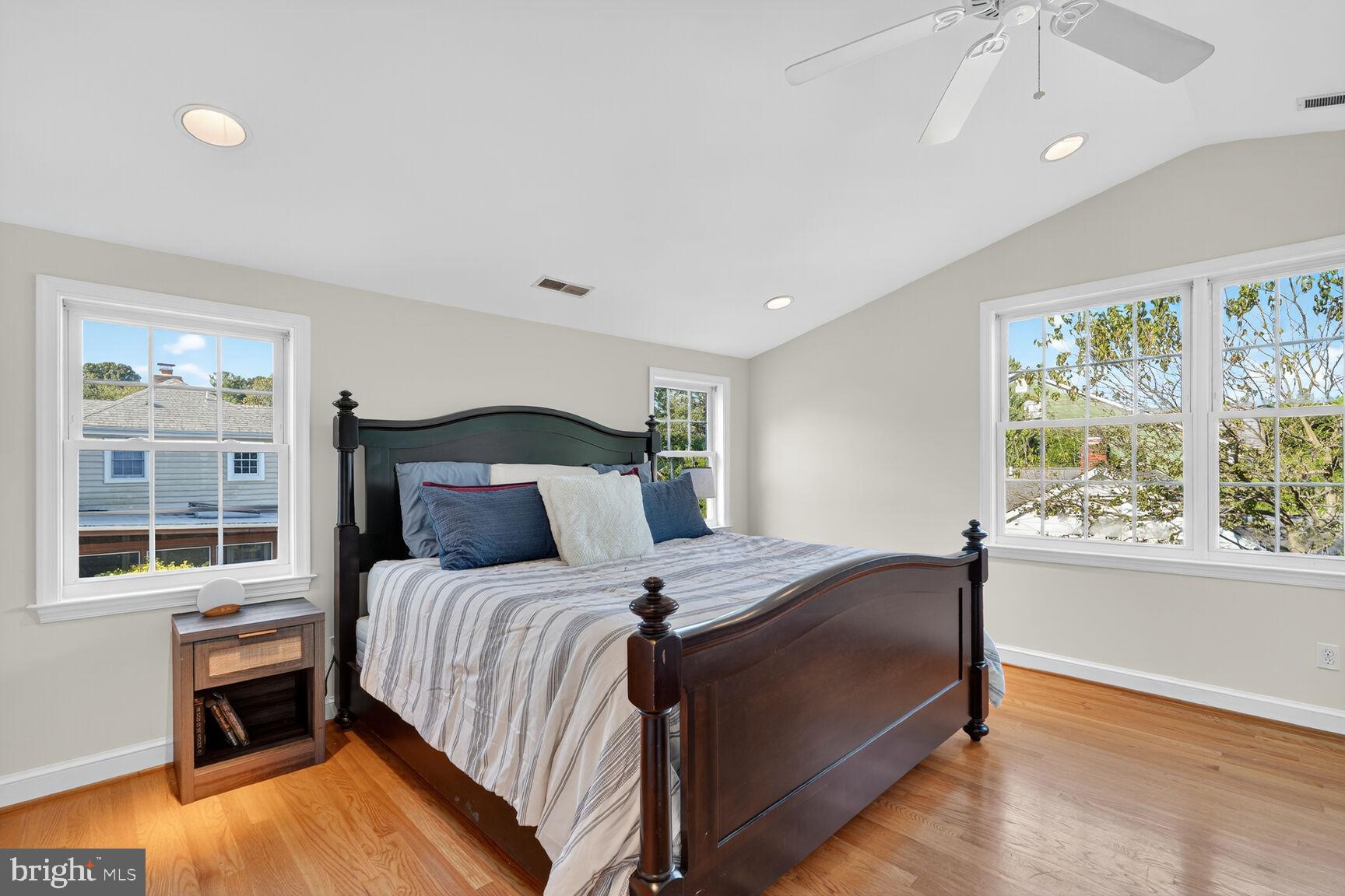 10406 Ewell Avenue Kensington, MD 20895 - Photo 32 of 42 a bedroom with a large bed and a window