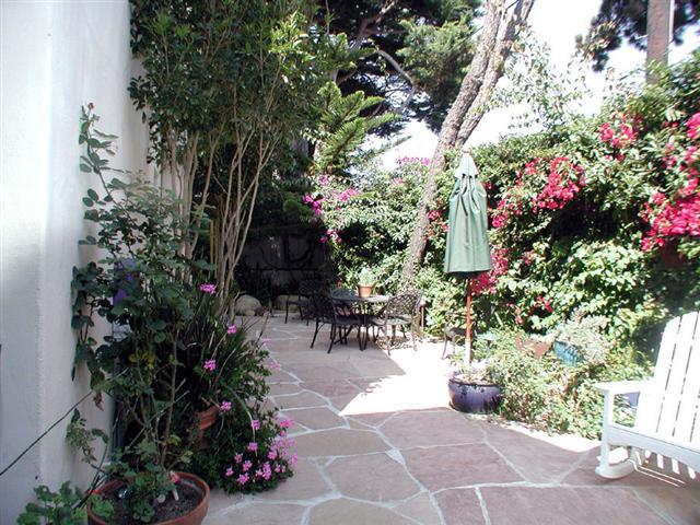 71 Olive Mill Road Montecito, CA 93108 - Photo 11 of 12 a view of a patio with table and chairs and potted plants