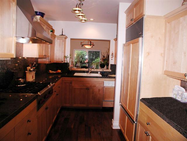 71 Olive Mill Road Montecito, CA 93108 - Photo 7 of 12 a kitchen with sink cabinets and living room