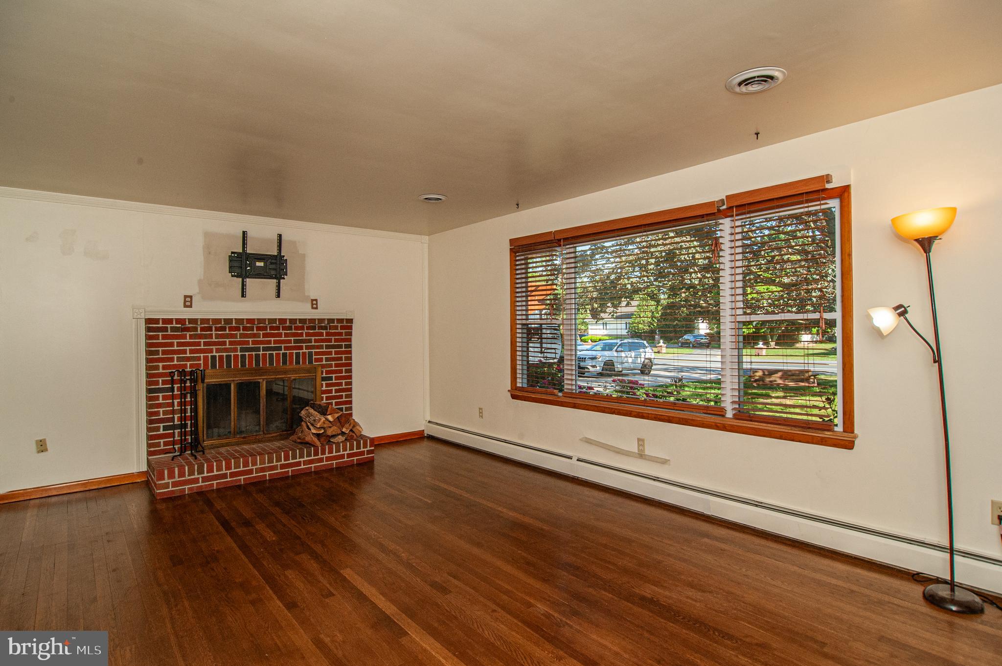 191 Irish Hill Road Felton, DE 19943 - Photo 15 of 40 Living Room Wood Burning Fire Place