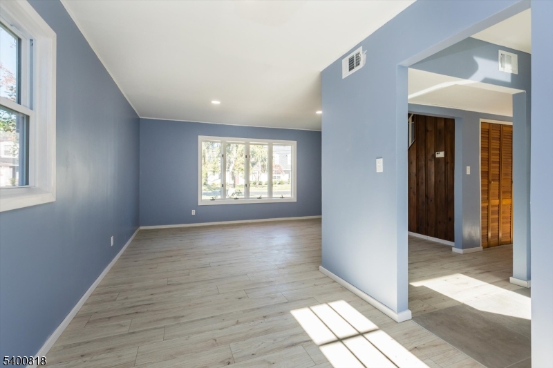 1 Pine Court Little Falls, NJ 07424 - Photo 5 of 24 a view of an empty room and window