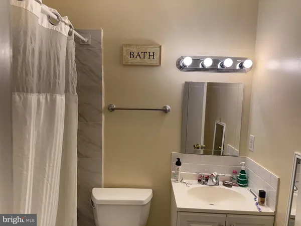 a dining room with a chandelier