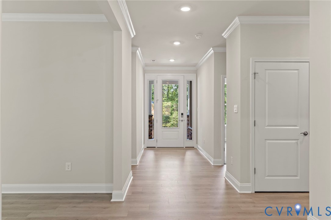 16801 Barmer Road Chesterfield, VA 23832 - Photo 4 of 20 a view of a hallway with wooden floor