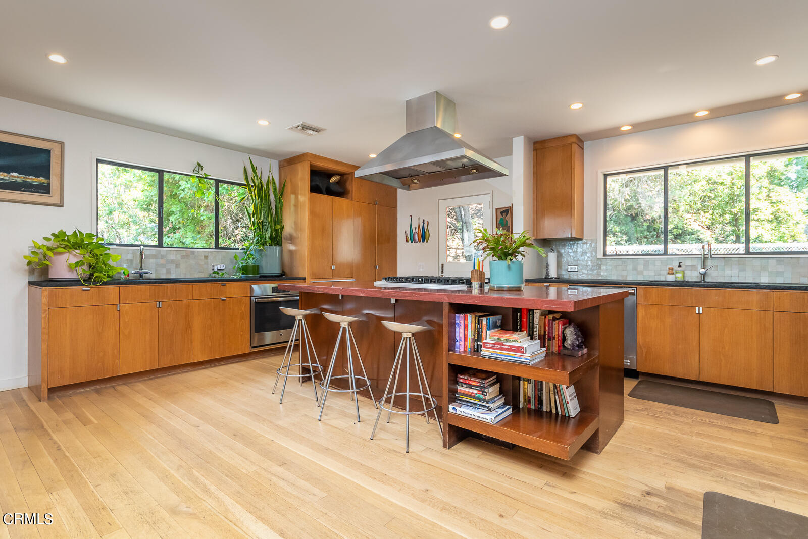 1471 Normandy Drive Pasadena, CA 91103 - Photo 12 of 41 a view of a dining room with furniture window and wooden floor