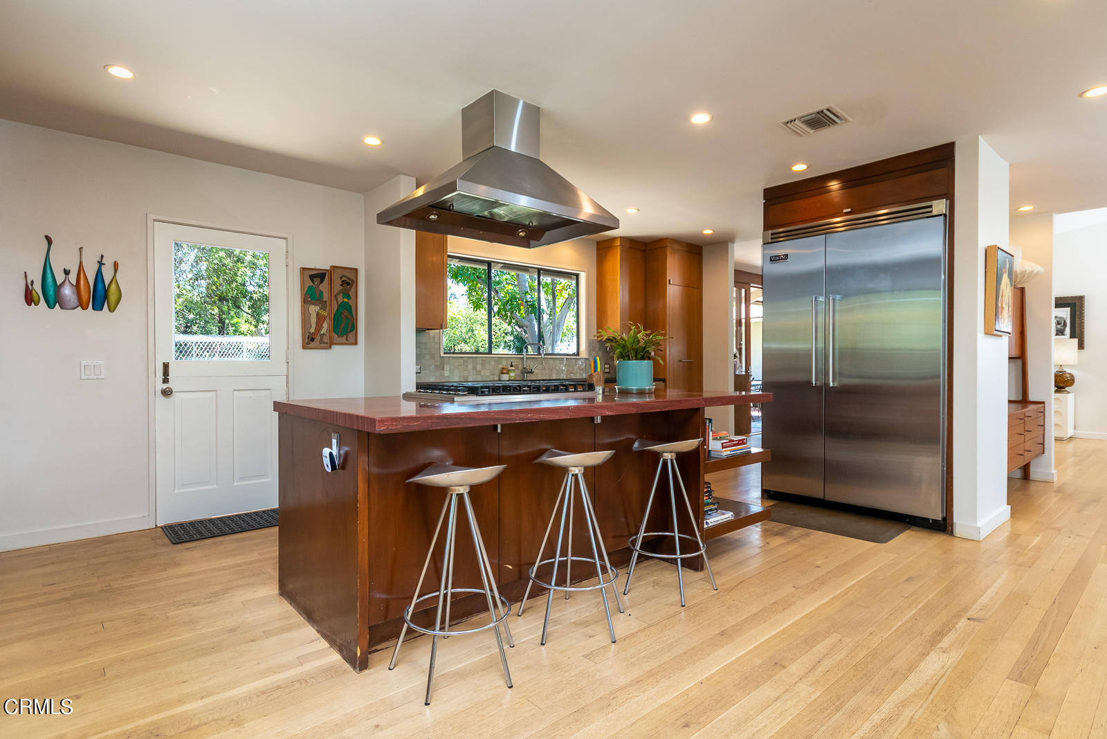 1471 Normandy Drive Pasadena, CA 91103 - Photo 13 of 41 a view of a dining room with furniture and a floor to ceiling window