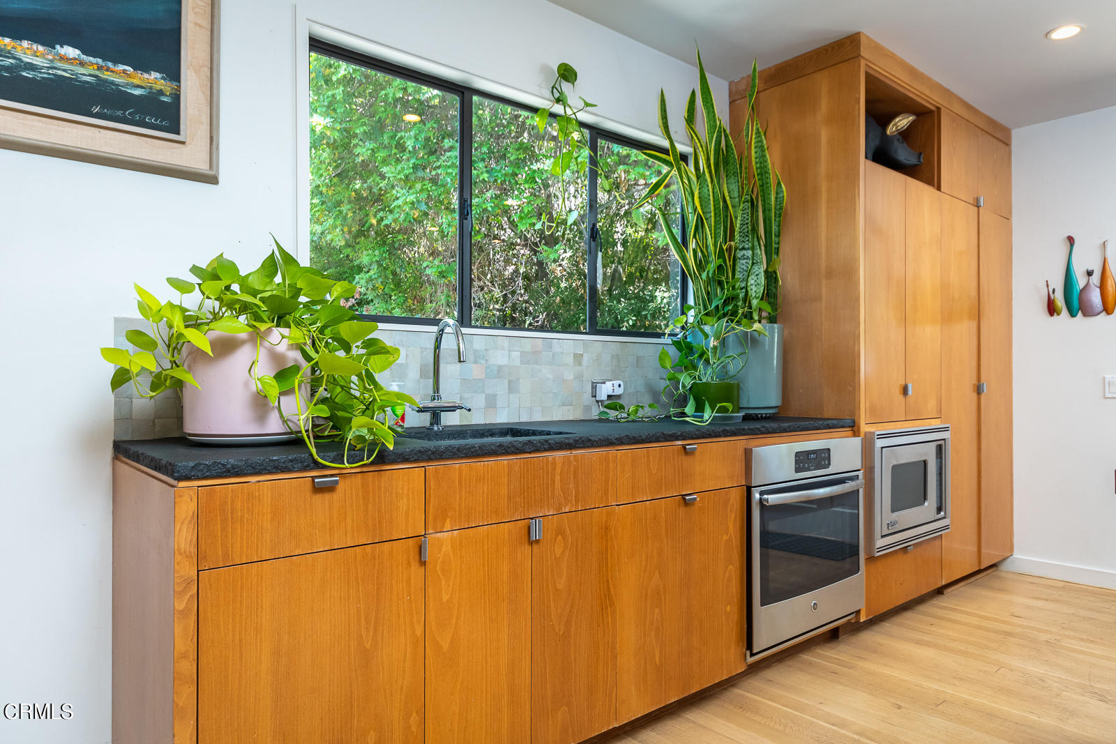 1471 Normandy Drive Pasadena, CA 91103 - Photo 14 of 41 a kitchen with stainless steel appliances granite countertop a refrigerator a sink and a potted plant