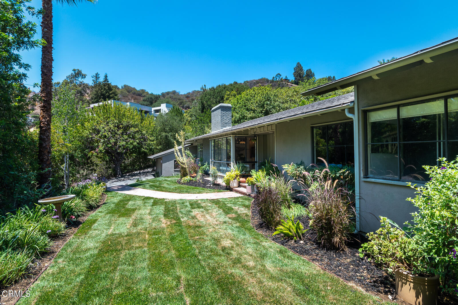 1471 Normandy Drive Pasadena, CA 91103 - Photo 3 of 41 a view of a house with backyard sitting area and garden