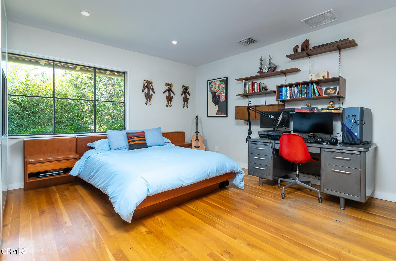 1471 Normandy Drive Pasadena, CA 91103 - Photo 30 of 41 a bedroom with a bed and wooden floor