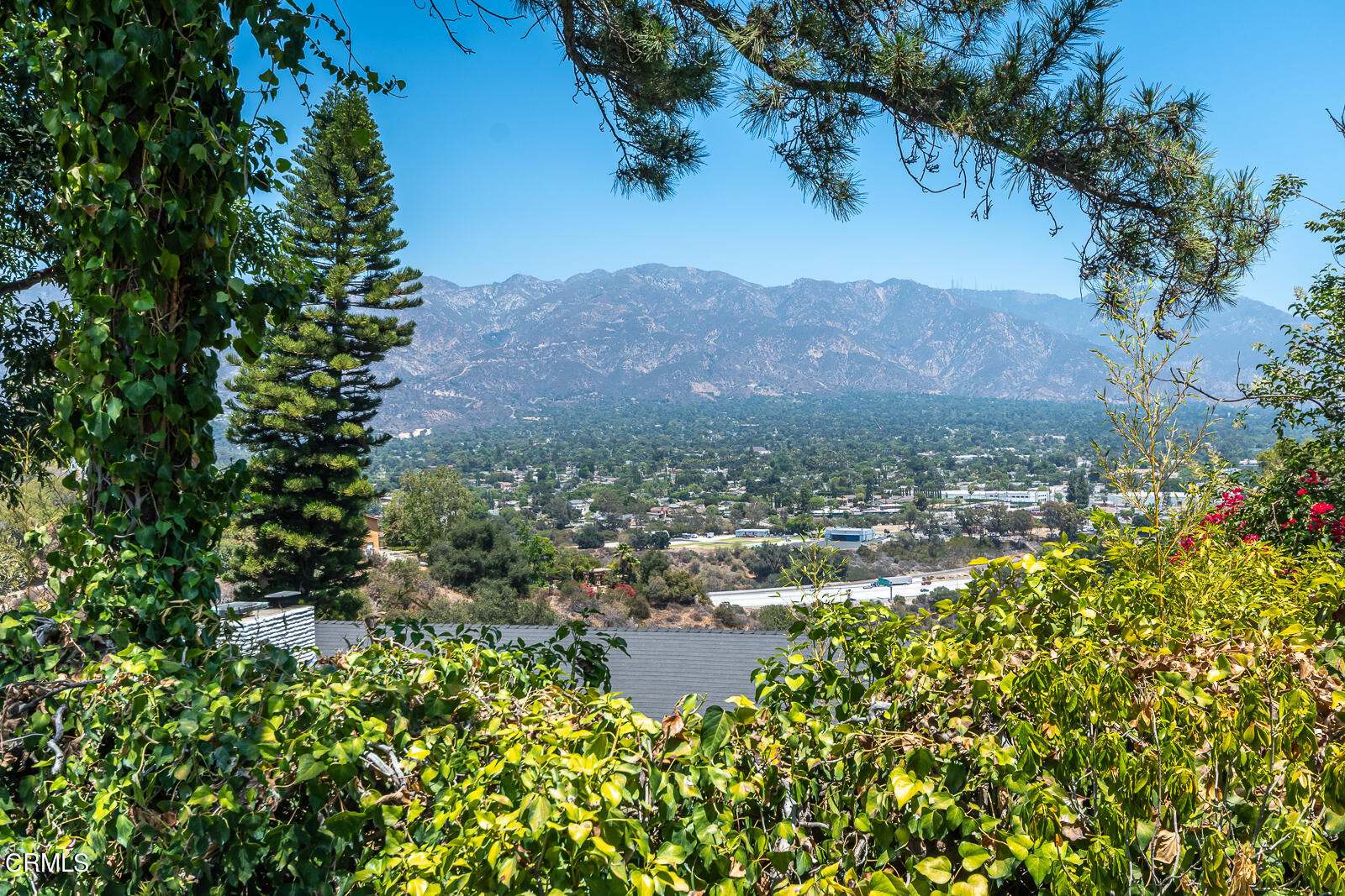 1471 Normandy Drive Pasadena, CA 91103 - Photo 34 of 41 a view of a lake with a mountain in the background