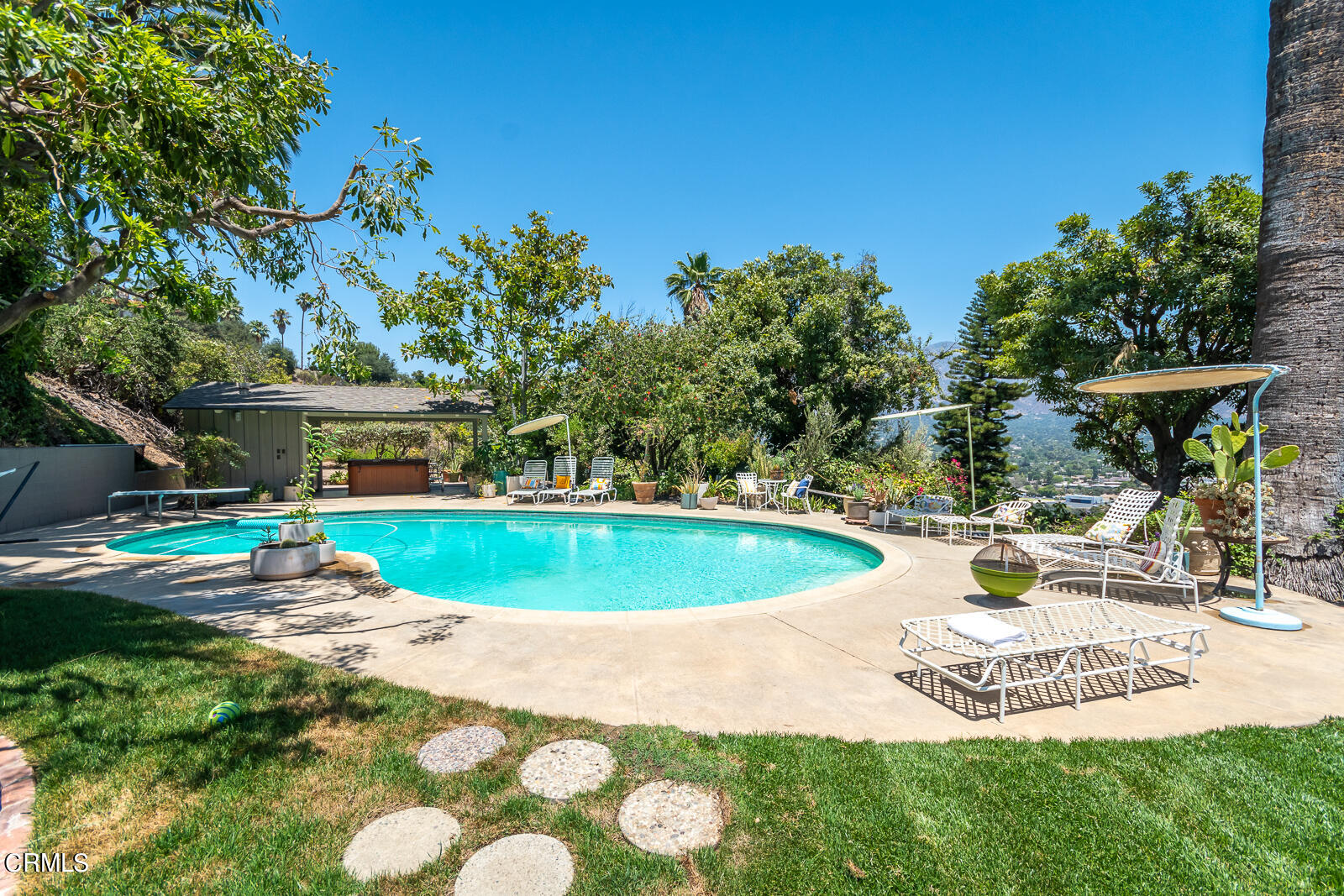 1471 Normandy Drive Pasadena, CA 91103 - Photo 35 of 41 a view of a swimming pool with a patio