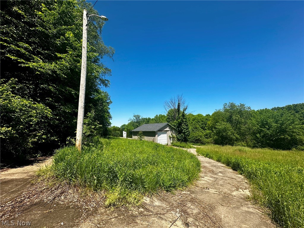 1028 Arbor Road Northeast Minerva, OH 44657 - Photo 5 of 7 extended driveway with cleared area and access to electric
