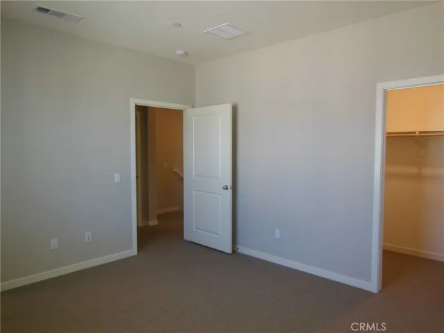 an empty room with closet