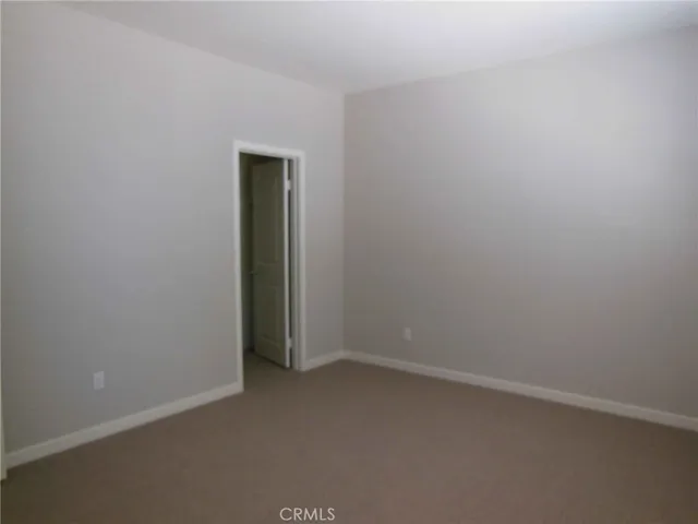 an empty room with closet