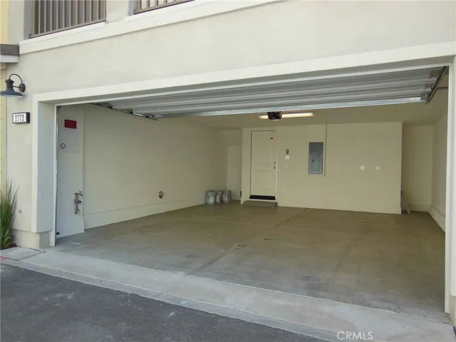 a view of a street with a building in the background
