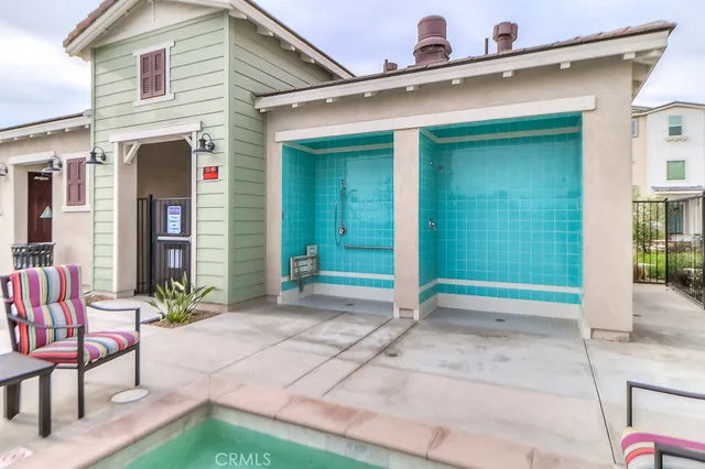 a view of a swimming pool with a lounge chairs