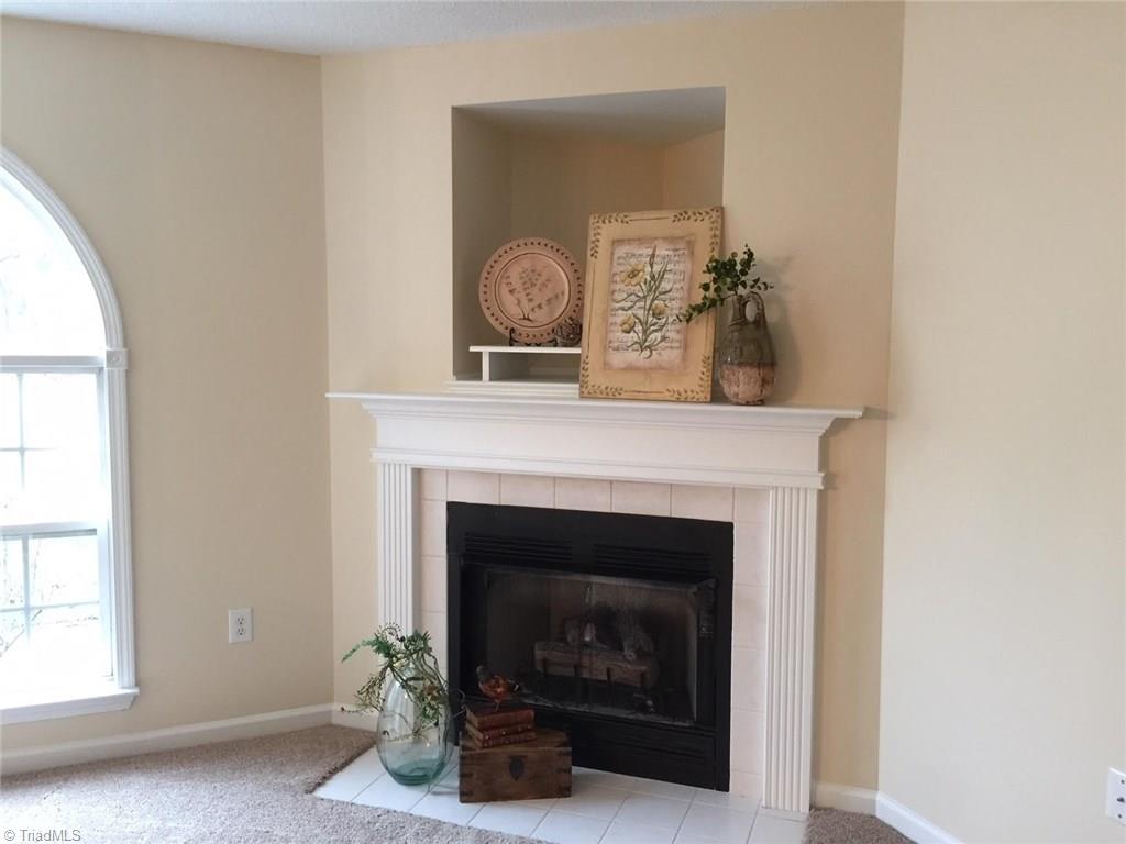 130 1B James Road High Point, NC 27265 - Photo 18 of 18 TV Platform, Gas Logs, Ceramic Tile Hearth & Decorative Mantel