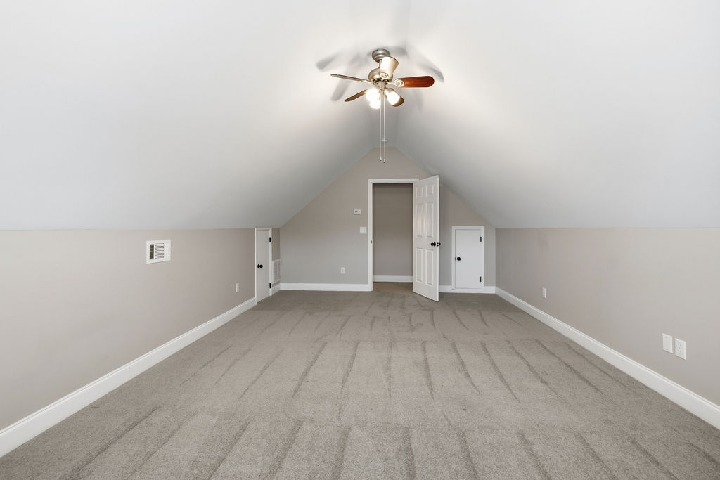 214 Friend Street Anderson, SC 29621 - Photo 18 of 40 This spacious attic space offers versatile possibilities for expansion or storage.