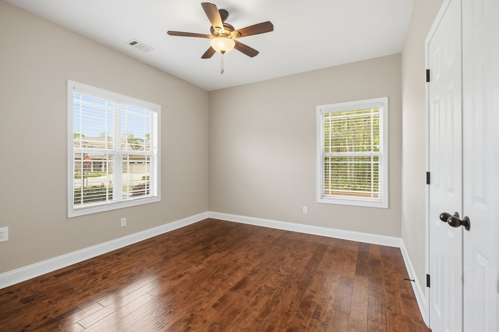 214 Friend Street Anderson, SC 29621 - Photo 20 of 40 Bright and airy room with polished hardwood floors awaits your personal touch.