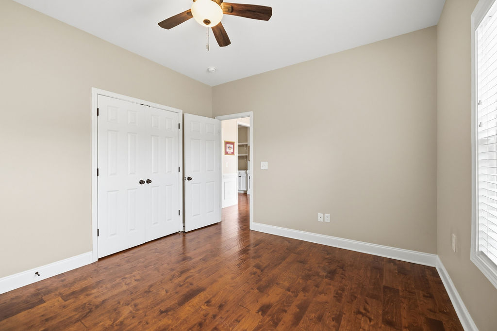 214 Friend Street Anderson, SC 29621 - Photo 21 of 40 This spacious room features rich hardwood flooring and convenient closet access.