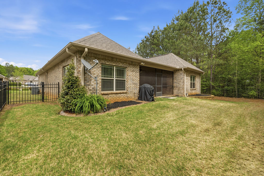 214 Friend Street Anderson, SC 29621 - Photo 34 of 40 This spacious backyard offers privacy and room for outdoor enjoyment.