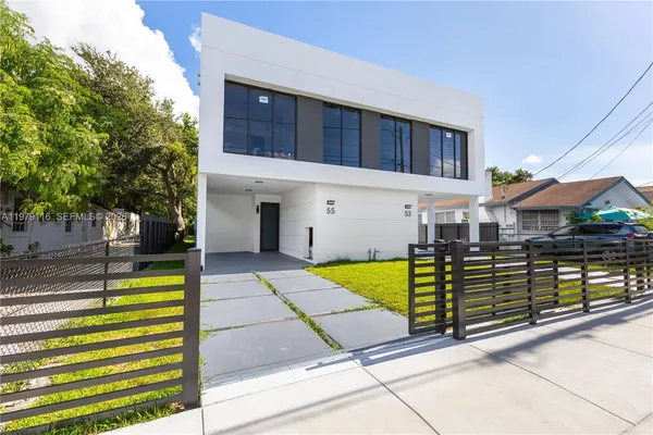 a view of a house with a swimming pool