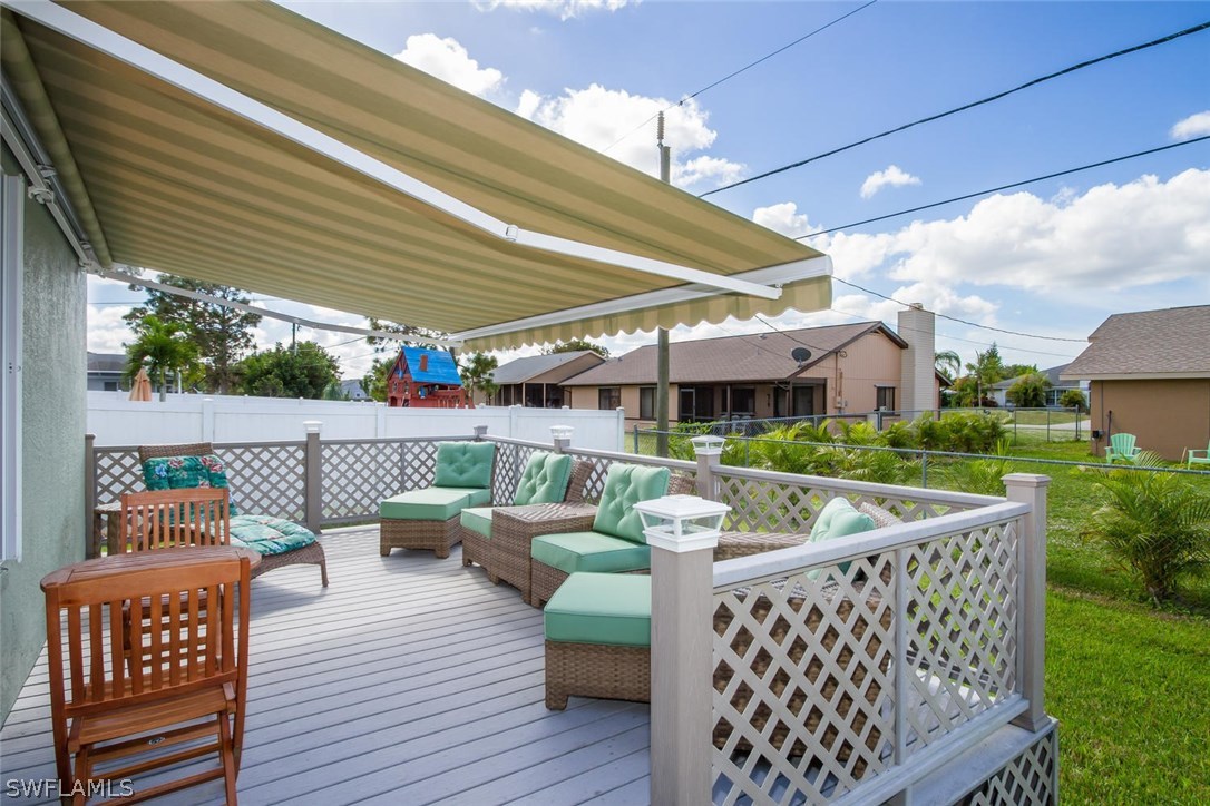 17436 Fuchsia Road Fort Myers, FL 33967 - Photo 3 of 25 a view of a patio with couches chairs and a table and chairs