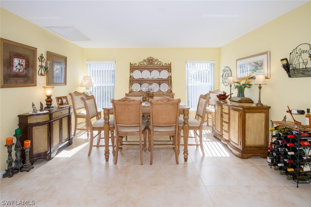 17436 Fuchsia Road Fort Myers, FL 33967 - Photo 7 of 25 a view of a livingroom with furniture and workspace